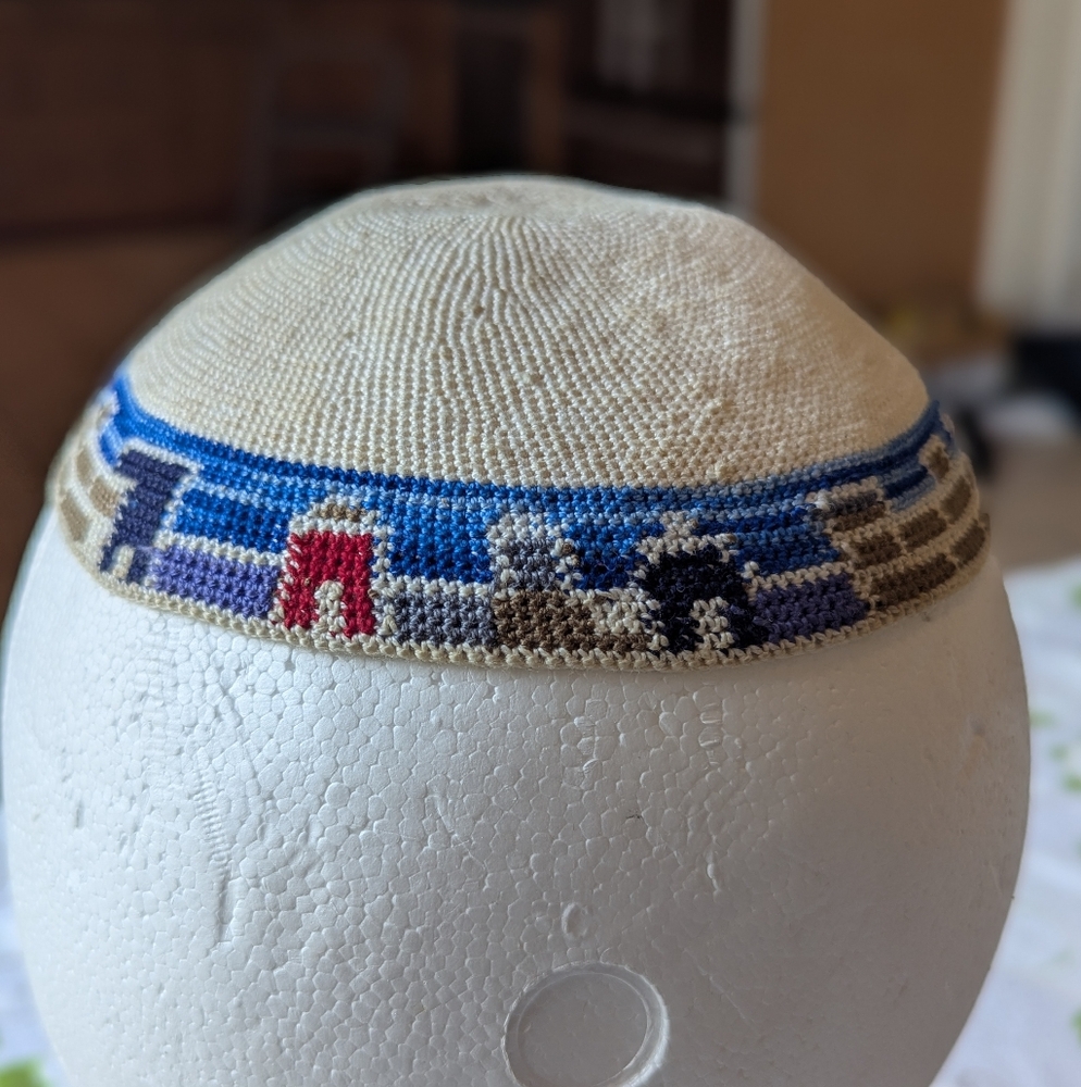 Colorful Knitted Kippah Of Jerusalem Skyline With White Base.